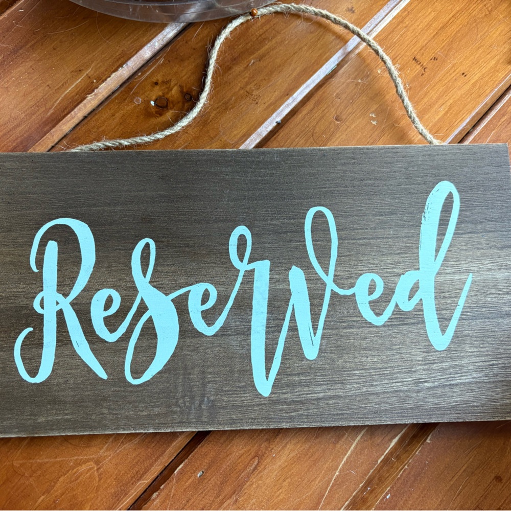 Wooden Reserved Sign with white Lettering